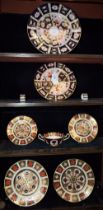 A pair of Royal Crown Derby 1128 pattern dessert plates; others, similar,