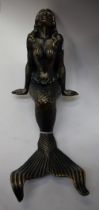 A reproduction cast metal figure,