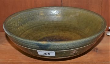 A Bernard Leech Studio pottery bowl, green bursting mottled craquelure glaze,