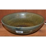 A Bernard Leech Studio pottery bowl, green bursting mottled craquelure glaze,