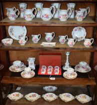 A quantity of Royal Crown Derby Posies pattern table ware, including cups and saucers, side plates,