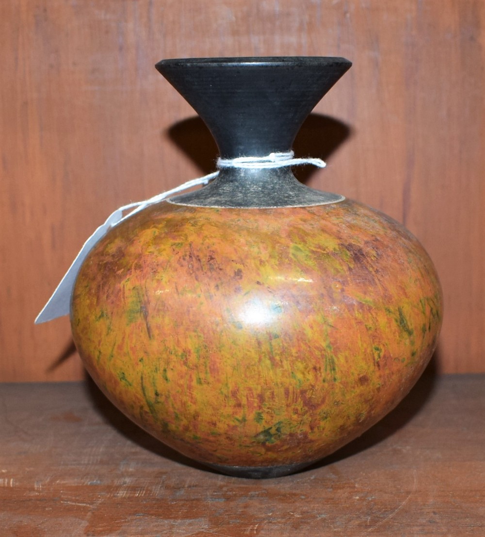 An earthenware ovoid vase, Anita Hoy, oxidised copper lustre body, 14cm high,