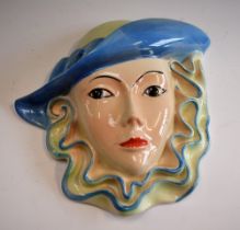 A mid 20th century Crown Devon wall mask, of a young woman, titled to verso 'Dorothy Anne',