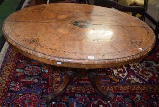 A Victorian burr walnut and marquetry oval breakfast table, c.