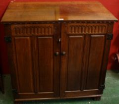 A Griffiths design oak side cabinet, in the 18th century taste,