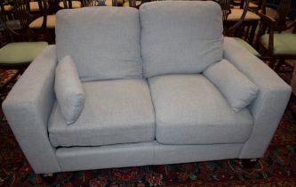 A contemporary two seat sofa,
