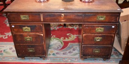 A '19th century' campaign style twin pedestal writing desk,