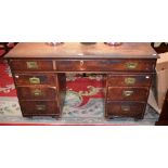 A '19th century' campaign style twin pedestal writing desk,