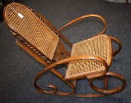 An early 20th century bentwood rocking chair,