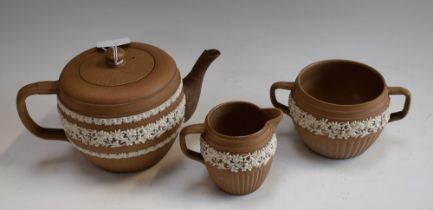 A Royal Doulton Lambeth Silcon Ware tea set, comprising teapot, sugar bowl and milk jug,