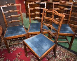 A set of four early 20th century oak dining/side chairs (4)