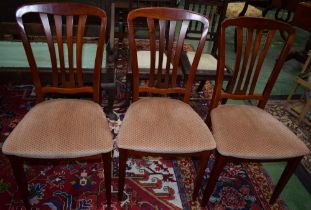 A set of three contemporary mahogany dining chairs (3)