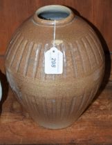 A reeded ovoid vase, attributed to Muriel Tudor-Jones, salt glazed in mottled brown throughout, 24.