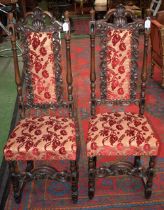 A pair of Spanish Colonial Revival hall chairs,