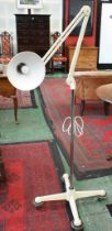 A floorstanding angle poise type lamp