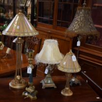 A contemporary gilt metal table lamp, leaded glass conical shade; another similar,