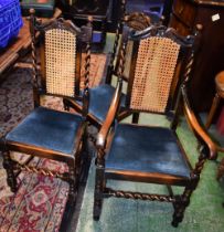 A set of six Jacobean Revival oak dining chairs,