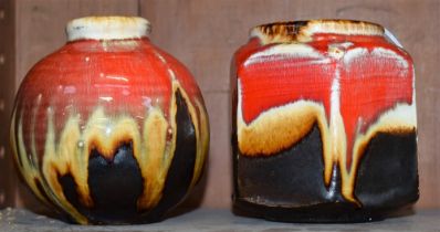 A stoneware hexagonal vase, slip glazed in red and brown, 11cm high,