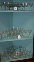 A suite of twelve Edwardian aperitif/sherry glasses; others,