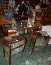 A reproduction mirrored console table; two mirrored side cabinets;