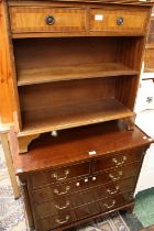 A George III inspired chest of two short over three long drawers;