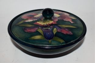 A Moorcroft Orchid pattern powder bowl and cover,