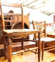 A 19th century oak framed country kitchen side chair, rush seat; another similar,