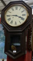 A late 19th century American Ansonia wall clock, cream dial, Roman numerals, twin winding holes,