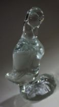 A Daum France clear crystal glass model of a duck, in subdued pose, head resting on its chest, 10.