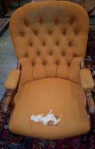 A Victorian mahogany framed open armchair, deep button back, scroll handrests,