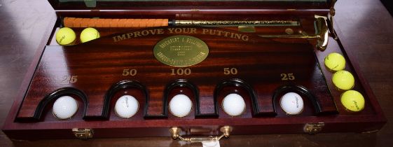 Golf - a Davenport and Sullivan mahogany cased Improve Your Putting set, Millennium 2000,