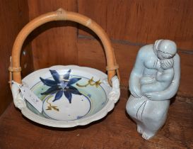 A stoneware Japanese inspired studio pottery basket, bamboo loop handle,