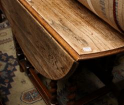 An early 20th century oak gateleg table