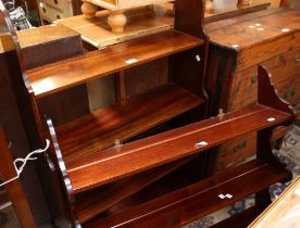 A mahogany floor standing waterfall bookcase; another similar,