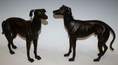 A pair of reproduction cast metal models, as Greyhounds,