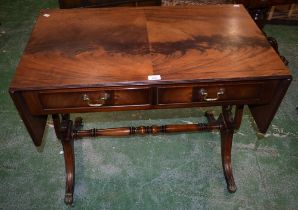 A mahogany sofa table