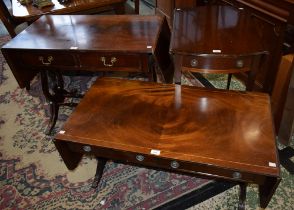 A reproduction mahogany Pembroke table; a similar sofa table;