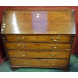 A George III oak bureau,