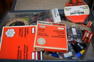 A quantity of car parts including clutch pads and break pads for Ford cars