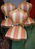 A set of three Louis XV design giltwood side chairs (3)
