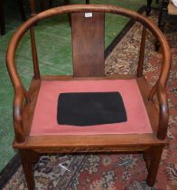 A contemporary Chinese horseshoe type chair, of broad and low proportions, 71.