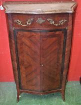 A Louis XV Revival pier cabinet, serpentine marble top above a drawer and a pair of cupboard doors,