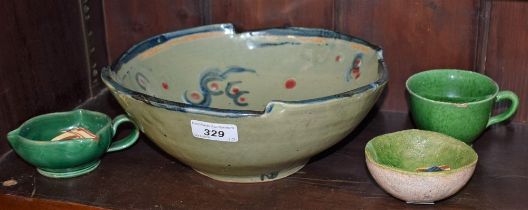 Studio Pottery - a Norah Braden studio pottery bowl, circular body with stepped deep blue lip rim,