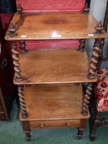 A Victorian mahogany three-tier whatnot, spirally turned supports, drawer to frieze,