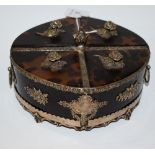 A Victorian silver coloured metal and tortoiseshell oval box, divided into quarters, flower handles,