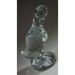 A Daum France clear crystal glass model of a duck, in subdued pose, head resting on its chest, 10.