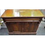 A Victorian mahogany side cabinet, rectangular top, long drawer over two drawer cupboard,