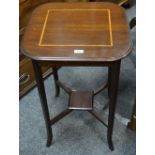 An Edwardian mahogany hall/lamp table with satinwood stringing throughout,