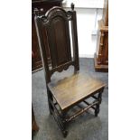 An early 19th century and later oak hall chair