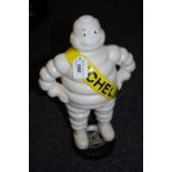 A reproduction cast metal figure, Bibendum Michelin Man,